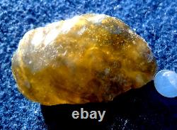 Libyan Desert Glass Meteorite Tektite impact specimen(1300 ct)Dimples Dark Gem