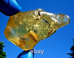 Libyan Desert Glass Meteorite Tektite impact specimen(450 ct)DARK INCLUSIONS