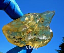 Libyan Desert Glass Meteorite Tektite impact specimen(450 ct)DARK INCLUSIONS