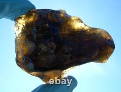 Libyan Desert Glass Meteorite Tektite impact specimen(650 crt)Dimples Dark Black