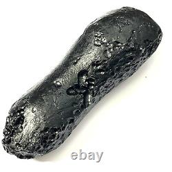 Tektite indochinite space rock impactite of meteorite impact stone 144 g bar