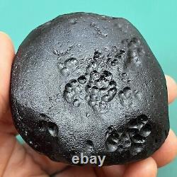 Tektite indochinite space rock impactite of meteorite impact stone 146 g round