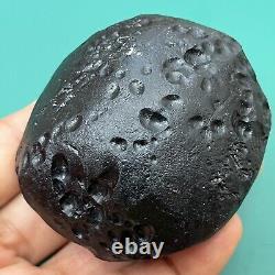 Tektite indochinite space rock impactite of meteorite impact stone 146 g round