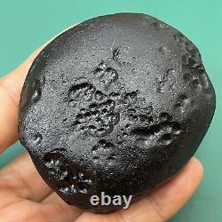 Tektite indochinite space rock impactite of meteorite impact stone 146 g round