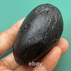 Tektite indochinite space rock impactite of meteorite impact stone 146 g round