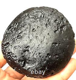 Tektite indochinite space rock impactite of meteorite impact stone 165 g round