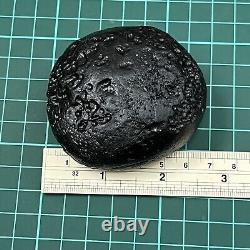 Tektite indochinite space rock impactite of meteorite impact stone 165 g round