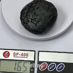 Tektite indochinite space rock impactite of meteorite impact stone 165 g round