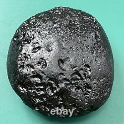 Tektite indochinite space rock impactite of meteorite impact stone 165 g round