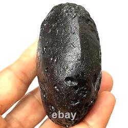 Tektite indochinite space rock impactite of meteorite impact stone 165 g round