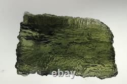 23,6 carats Moldavite de la République tchèque de 24 mm de long provenant de l'impact d'une météorite.