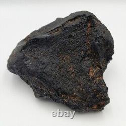 547 g. Australasian Muong Nong Black Tektite Meteorite Impact Layered Glass Rock<br/> 	  
<br/>
 547 g. Australasian Muong Nong Tektite météorite noire couche d'impact roche de verre stratifiée