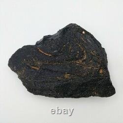 661 g. Rare Australasian Muong Nong Tektite Meteorite Impact Layered Glass Rock  <br/>  	
<br/>661 g. Roche en verre stratifié rare d'impact de météorite Tektite Muong Nong australasienne