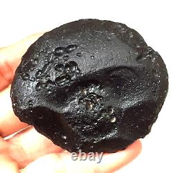 Pierre d'impact de météorite indochinite Tektite space rock 120 g gros rond