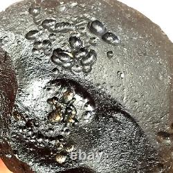 Pierre d'impact de météorite indochinite Tektite space rock 120 g gros rond