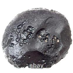 Pierre d'impact de météorite indochinite Tektite space rock 120 g gros rond