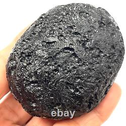 Roche spatiale de Tektite indochinite impactite de météorite 151 g ovale