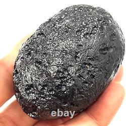 Roche spatiale de Tektite indochinite impactite de météorite 151 g ovale