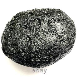 Roche spatiale de Tektite indochinite impactite de météorite 151 g ovale