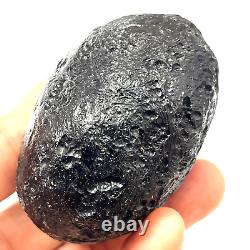 Roche spatiale de Tektite indochinite impactite de météorite 151 g ovale