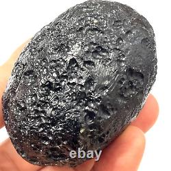 Roche spatiale de Tektite indochinite impactite de météorite 151 g ovale