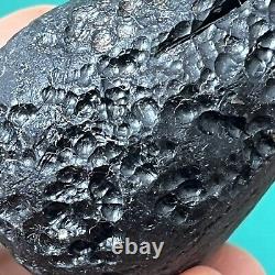 Tektite indochinite roche spatiale impactite d'impact de météorite 92 g courbe de pierre