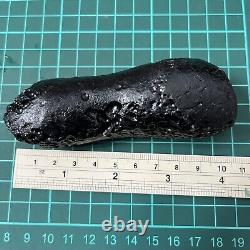 Tektite indochinite roche spatiale impactite de pierre d'impact de météorite de 144 g bar