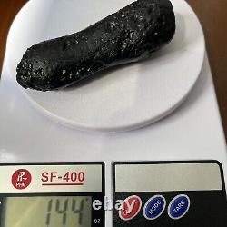 Tektite indochinite roche spatiale impactite de pierre d'impact de météorite de 144 g bar